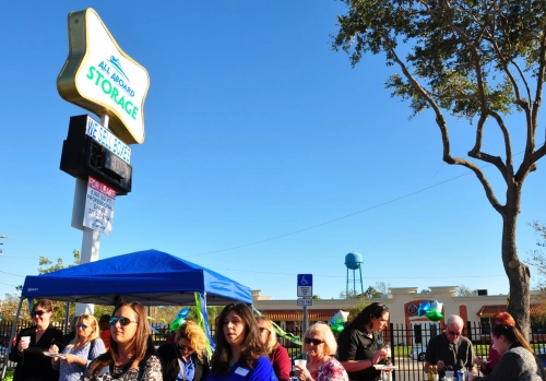 Crowd at local storage facility grand opening party