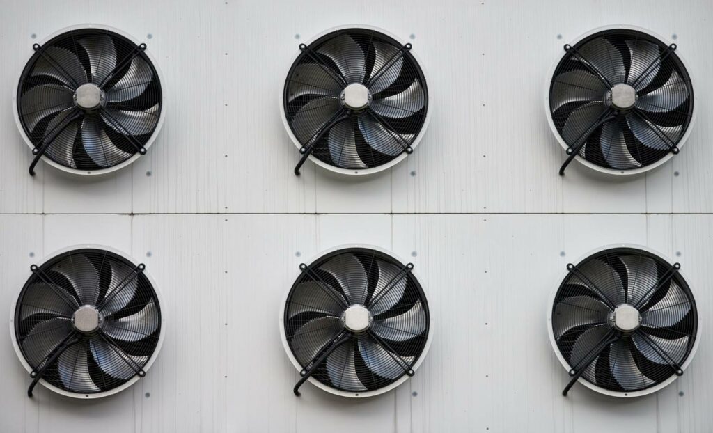 Fans blowing as part of an air conditioning and cooling system for a building. 