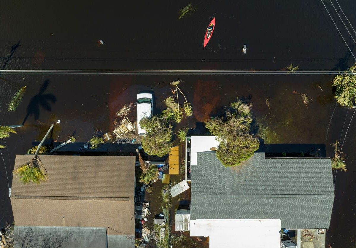 An aerial view of a flooded neighborhood after a hurricane.